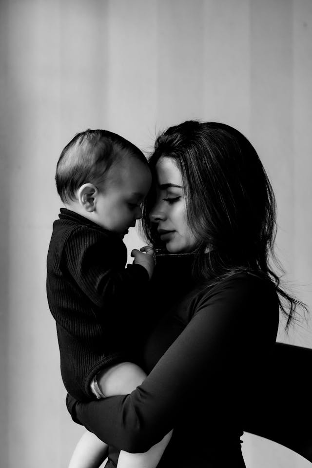 Maggielamarre Mom entrepreneur holding a baby